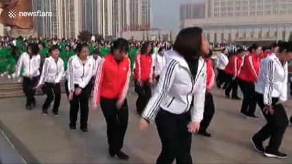 More than 1,000 women mark International Women's Day by dancing together