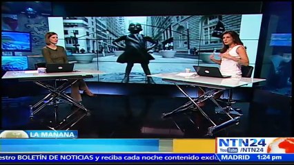 Una desafiante niña de bronce recuerda a Wall Street el papel de la mujer