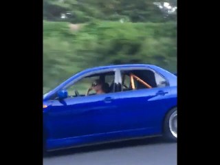 This chick has a nice Evo, and isn't scared to drive it!