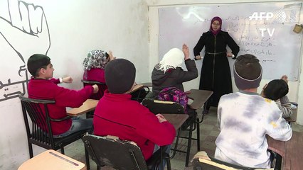 Deaf Syrians learn the language of war