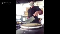 Chinese chef shows off meat cleaver spinning skills