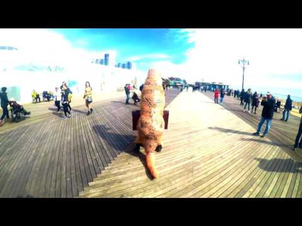 Man in T-Rex Costume Takes to Coney Island Boardwalk