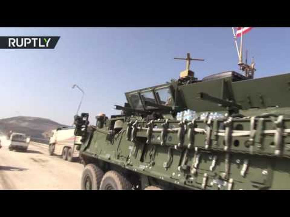 US armoured convoy enter Manbij, Syria
