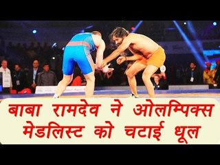 Baba Ramdev beats Olympic medallist Andrey Stadnik by 12-0 in promotional PWL bout| वनइंडिया हिंदी
