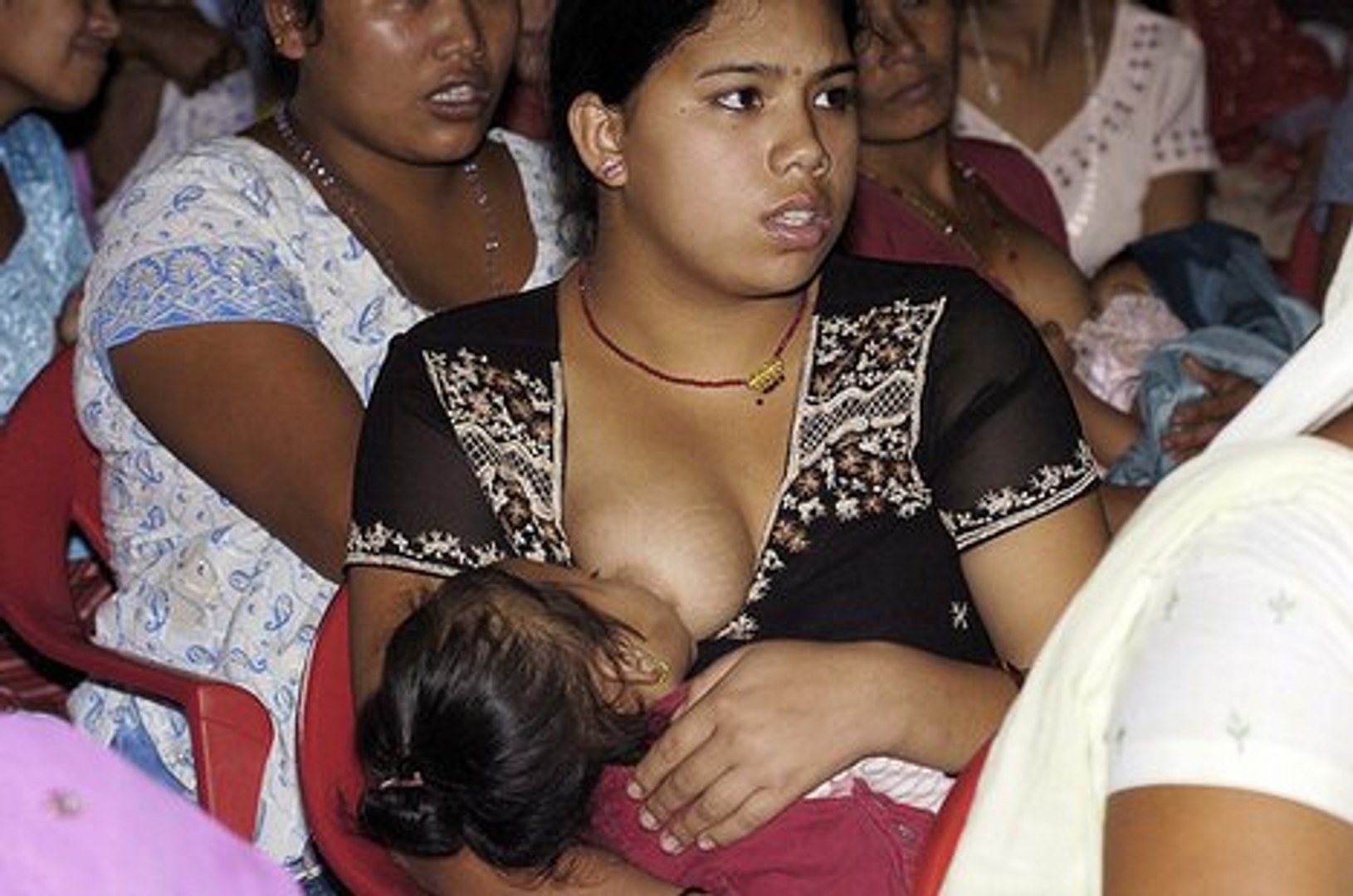 Breast feeding husband poor and hungry husband saved by wife