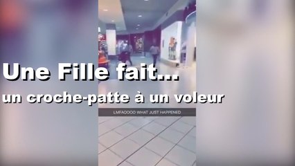 Une Fille fait un énorme croche-patte à un voleur qui tenter de s'enfuir