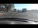 Cyclist Miraculously Avoids Getting Hit by a Truck