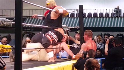 Rikishi stinkfaces Tom Floyd
