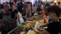 Stroll the streets of Hanoi's Old Quarter and enjoy the street food