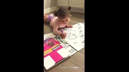 Addie coloring a huggies pullups box