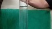 Fast Spinning Golf Ball Dropped in Water in Slow Motion