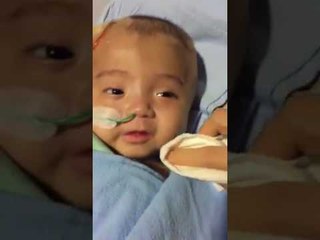 cậu bé Phạm Đức Lộc mang trong mình căn bệnh não úng thủy