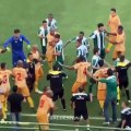 Brazilian football match descends into chaos as players and fans brawl!