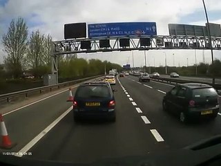 idiot caravan driver thinks indicating stops moving traffic