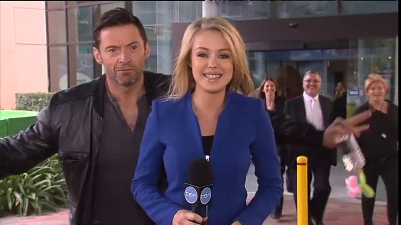 Hugh Jackman photobombs reporter Jessica Turner