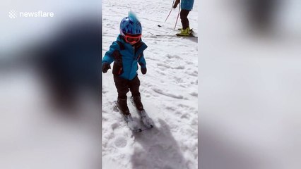Boy who was told he would never walk skis for the first time