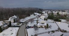 Neighborhood Covered in Snow During Storm