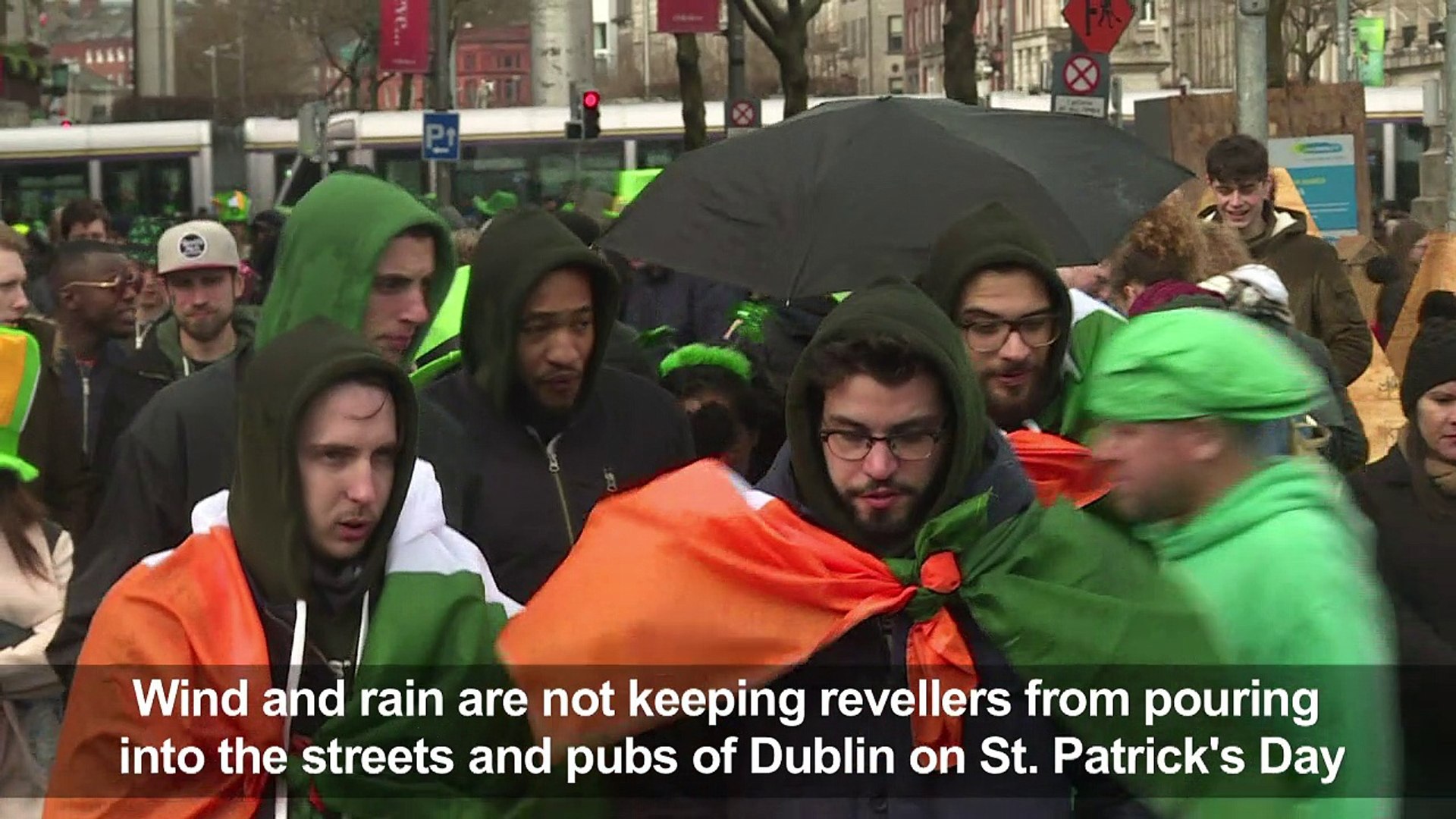 ⁣St. Patrick's Day in full swing in Dublin despite the rain