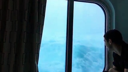 Look out the porthole of the cruise ship. What happens next is a little creepy!