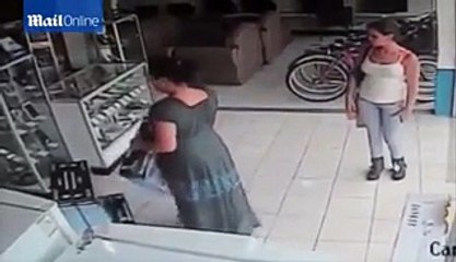 Woman steals TV store