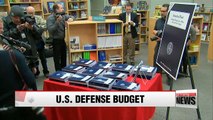 U.S. beefs up defense budget, cuts diplomacy and environment spending