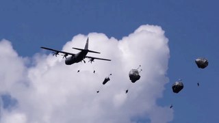 C-130J Super Hercules practicing airdrop training personnel and equipment