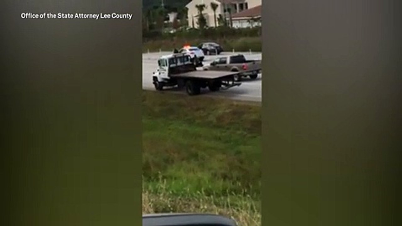 Bystander shot and killed man who was beating up police officer in the middle of the road