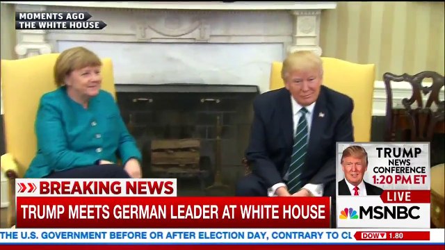 donald trump , angela merkel hand shaking