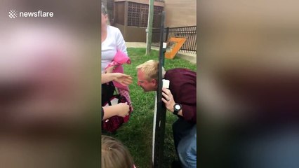 Uncle gets head stuck in children's photo op stand