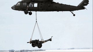 UH-60M Helicopter moving 4,800 pound M101A1 105mm Howitzer