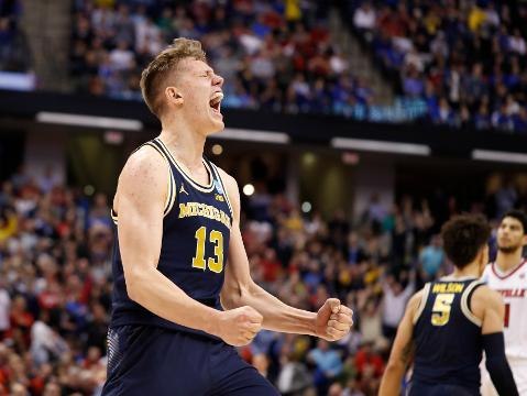 Michigan takes down Louisville