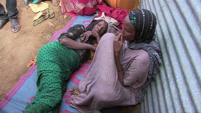 Cloaked in dust and rags, Somalis flee a looming famine