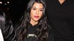 Kourtney Kardashian Flashes Leg In Skin-Tight Lace Pants