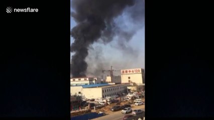 Doctor continues treating patient as fire rages outside hospital