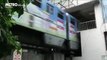 Chine: Ce train traverse un immeuble de 19 étages alors qu'il est habitét