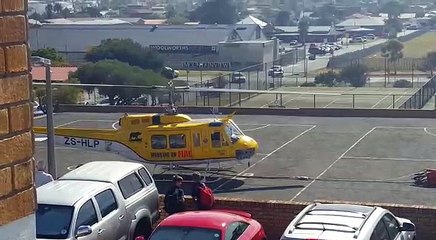 Helicopter fills up at school