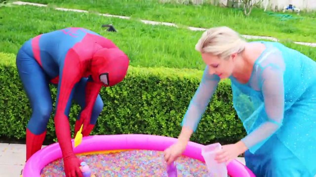 Frozen Elsa & Spiderman Buried Head in Orbeez sand surprise vs Joker Pranks Fun Superhero Real Life Nwp