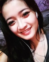 Beautiful Indonesian woman with a golden voice.