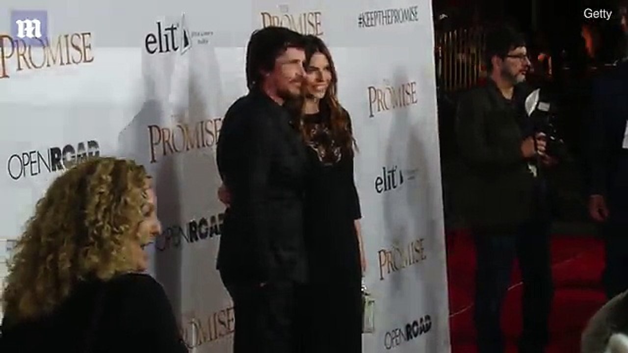 Christian Bale and wife Sibi cosy up at The Promise premiere