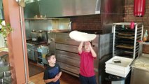 Pint Sized Pizza Tossing Brothers