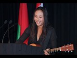 Carol Zhao (CAN) sings for her supper
