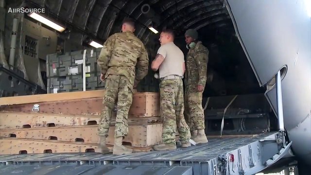 Unloading AH-64 Apache Helicopters from C-17 Globemaster III