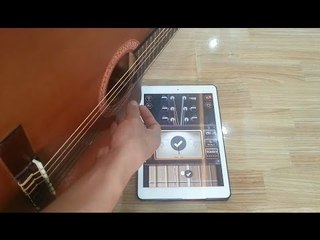Căng Dây Đàn Guitar Bằng  App Guitar Tuner Trên Ipad,Điện Thoại.