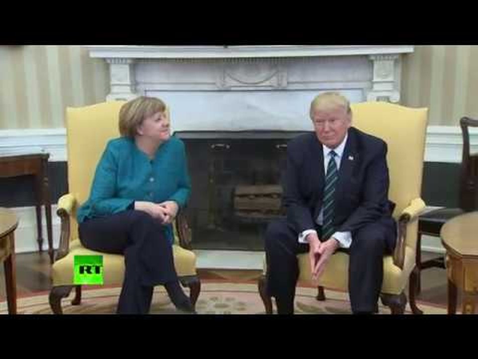 Weird moment Trump ignores media prompts to shake hands with Merkel