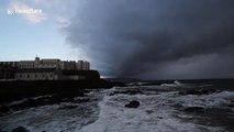 Ominous storm sweeps across the sea off Northern Ireland