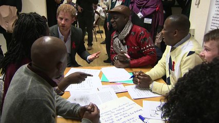 Harry follows in Diana's foosteps by visiting HIV charity