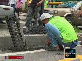 Saksi: DPWH, nag-imbentaryo ng mga manhole na natakpan ng aspalto sa Metro Manila