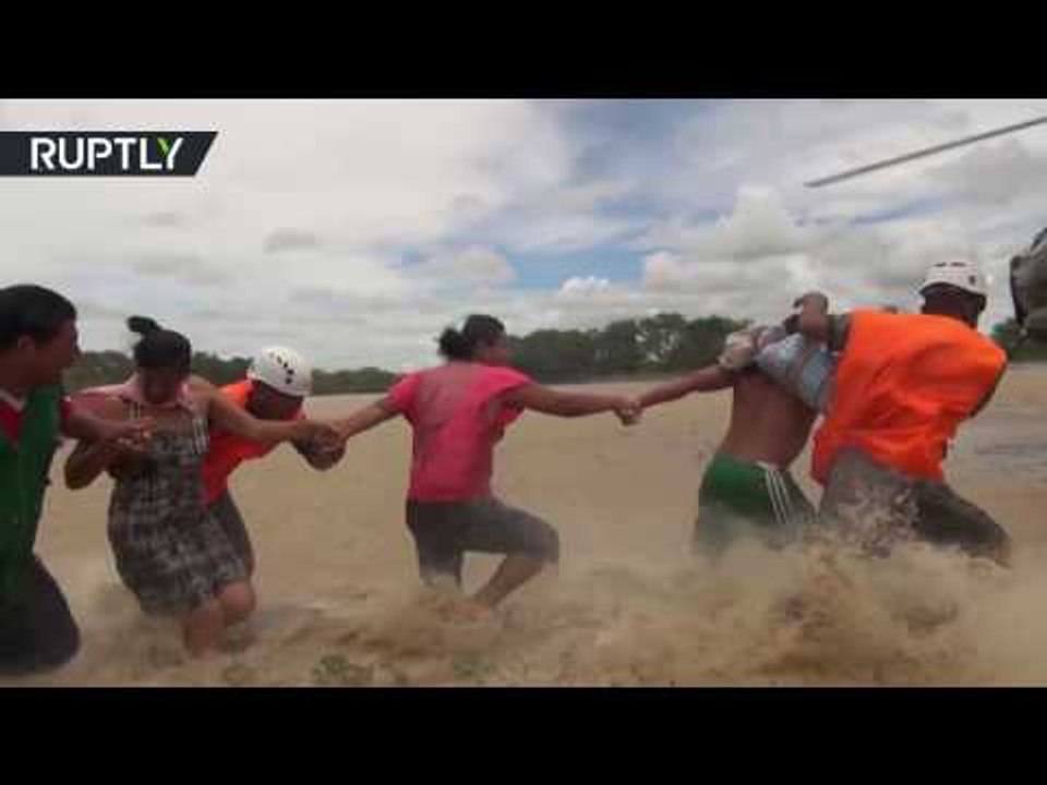 RAW: Peruvians trapped in powerful flood, evacuated by helicopters