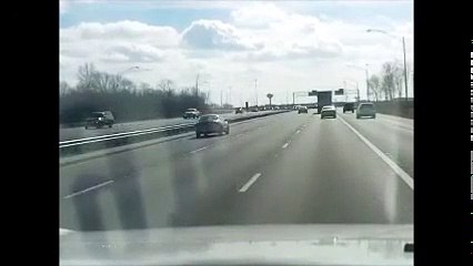 Car Cuts Off Trailer to Make Exit