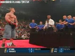 wwe raw john cena vs jonathan coachman in a tables match